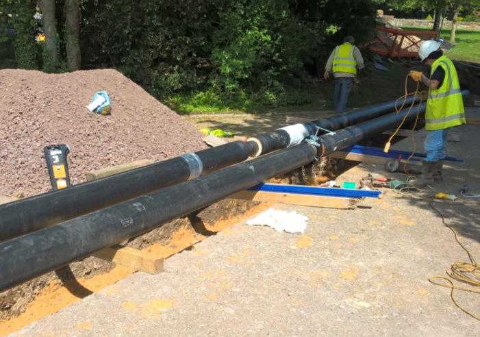 DN150 steel DH pipe installation at Clayesmore School
